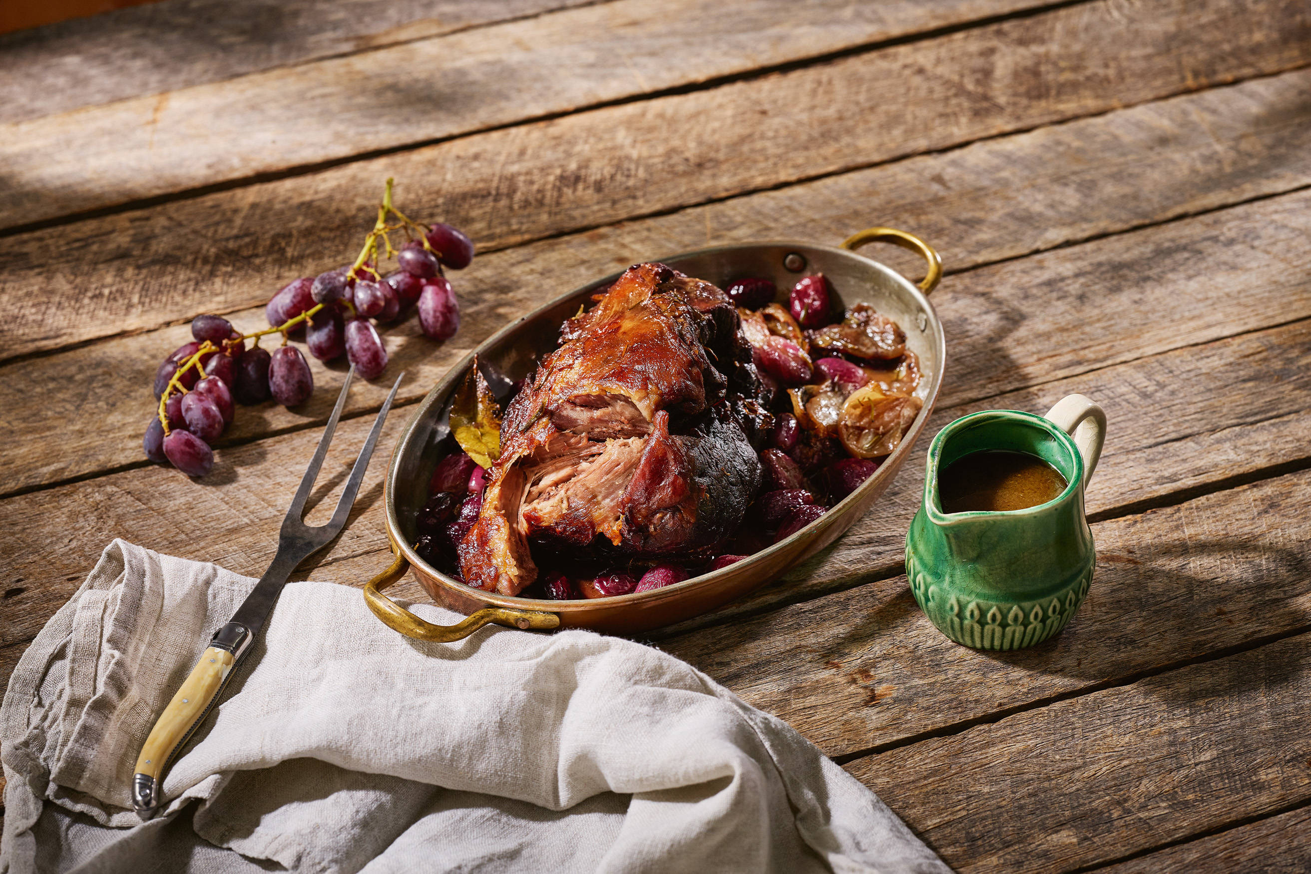 Slow Cooked Boneless Lamb Leg with Rosemary and Grapes Recipe